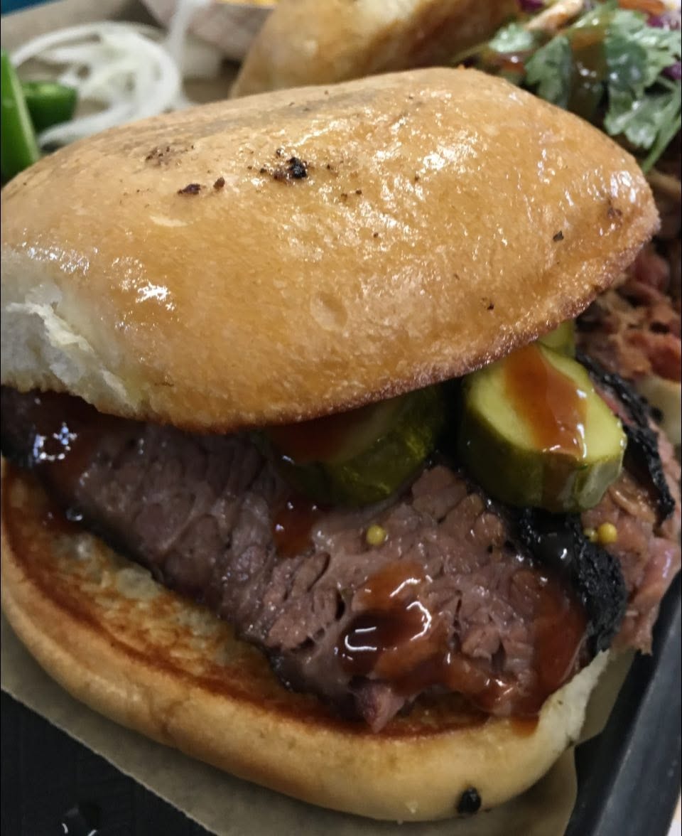 Pulled pork sandwich piled high Texas style